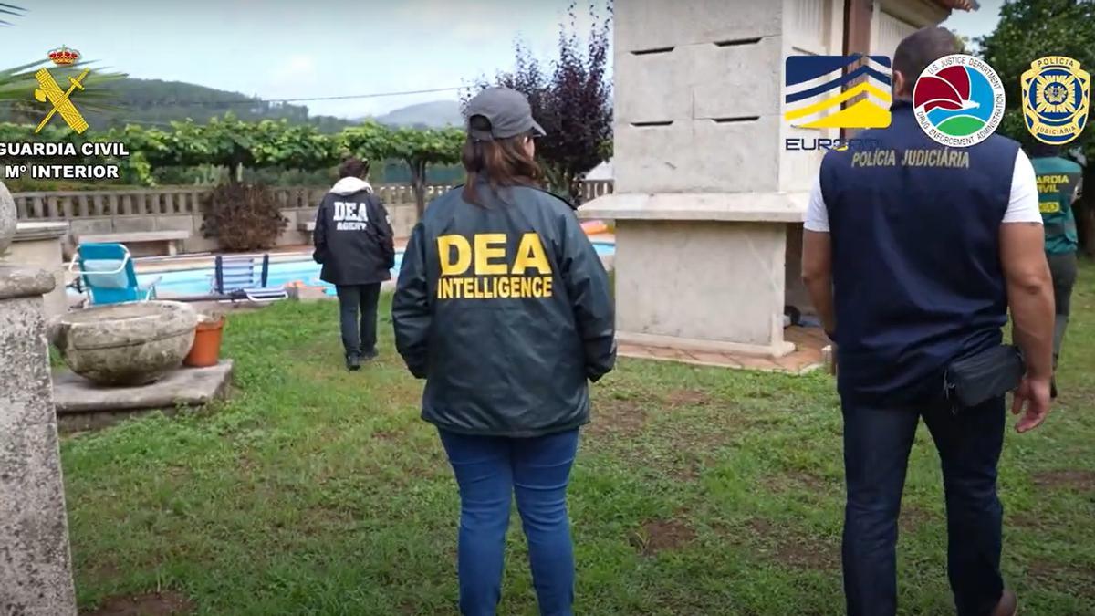 Agentes de la DEA, policía portuguesa y Guardia Civil, durante la intervención