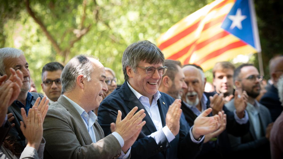 Jordi Turull junto a Carles Puigdemont en una imagen de archivo.