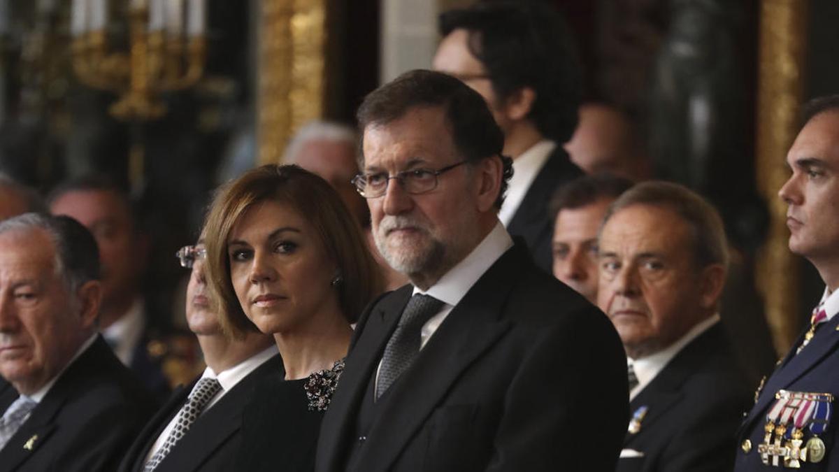 El expresidente del Gobierno Mariano Rajoy junto a la exministra y ex secretaria general del PP, María Dolores de Cospedal.